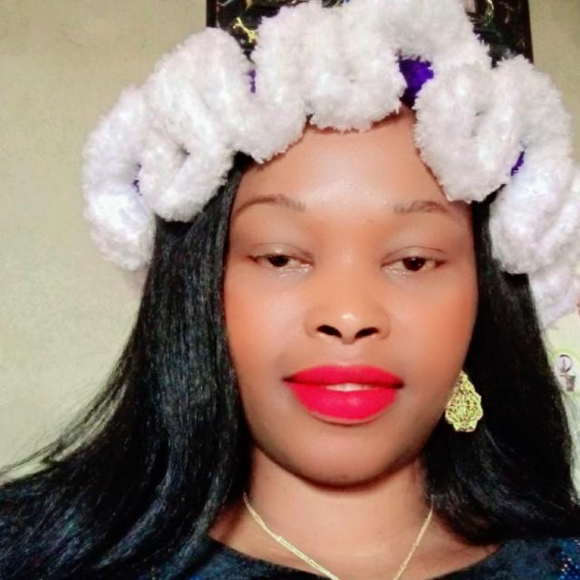 Amaka Augusta, Nigerian gospel singer and songwriter smiling in a professional portrait